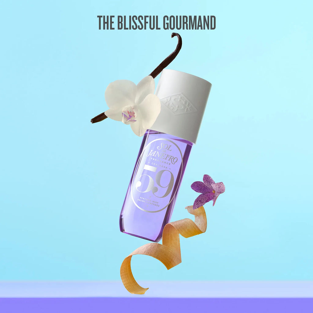 Perfume bottle with vanilla bean and orchid on a light blue background, featuring 'The Blissful Gourmand' brand.