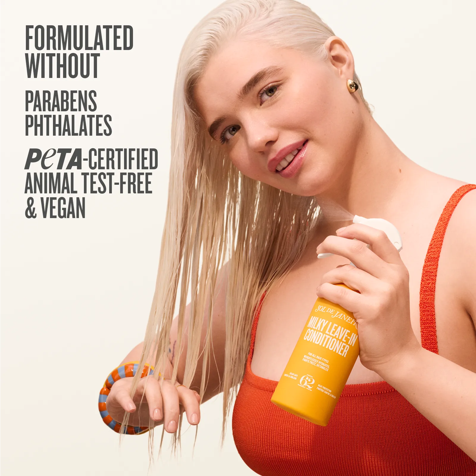Woman holding a bottle of leave-in conditioner with product features listed on the left.