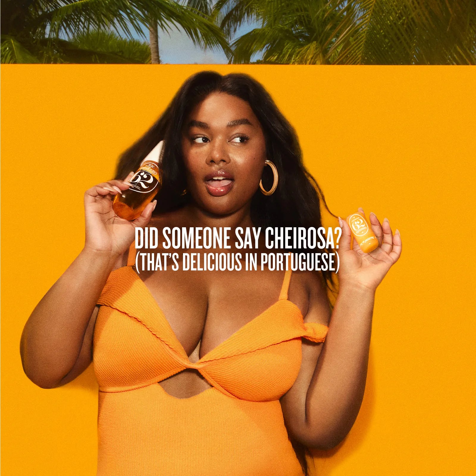 Woman in an orange dress holding two bottles against a yellow background with text.