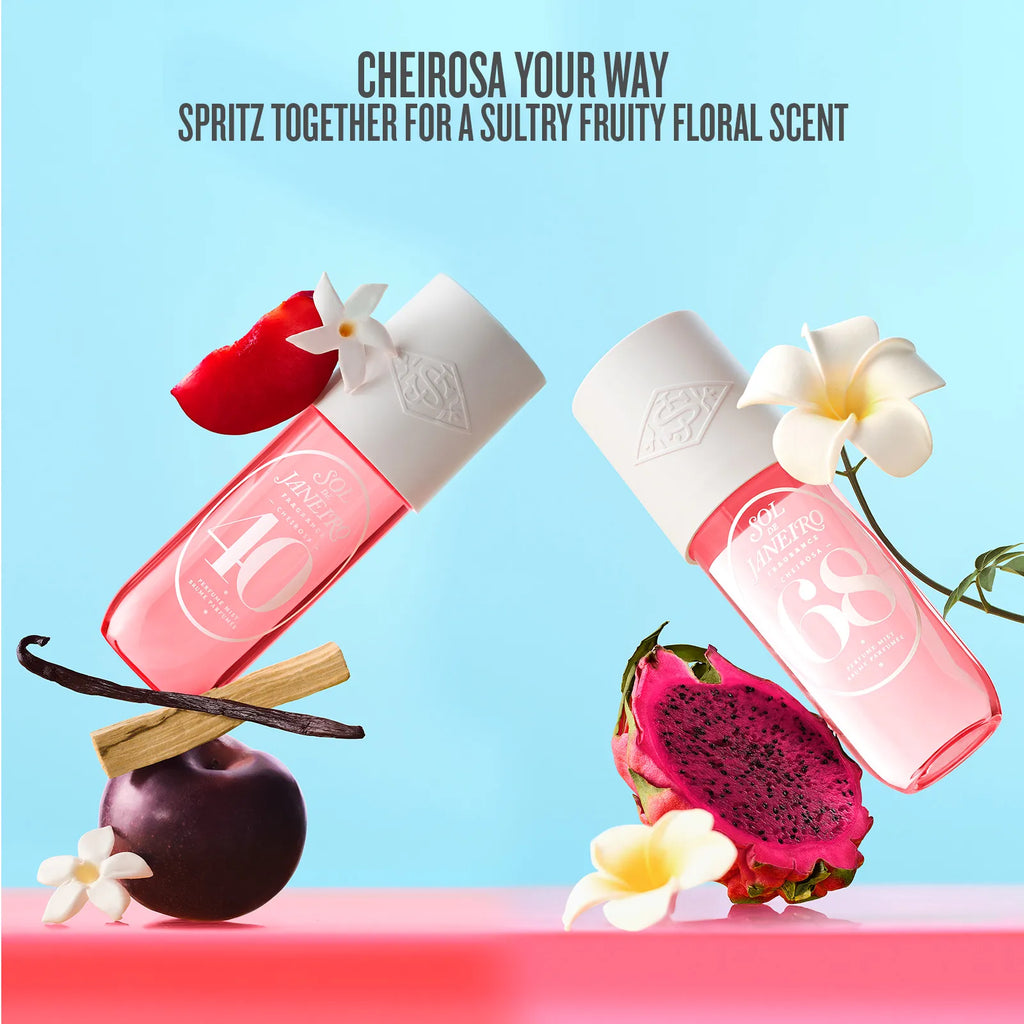 Two pink and white bottles with floral elements on a blue background, promoting a sultry fruity floral scent.