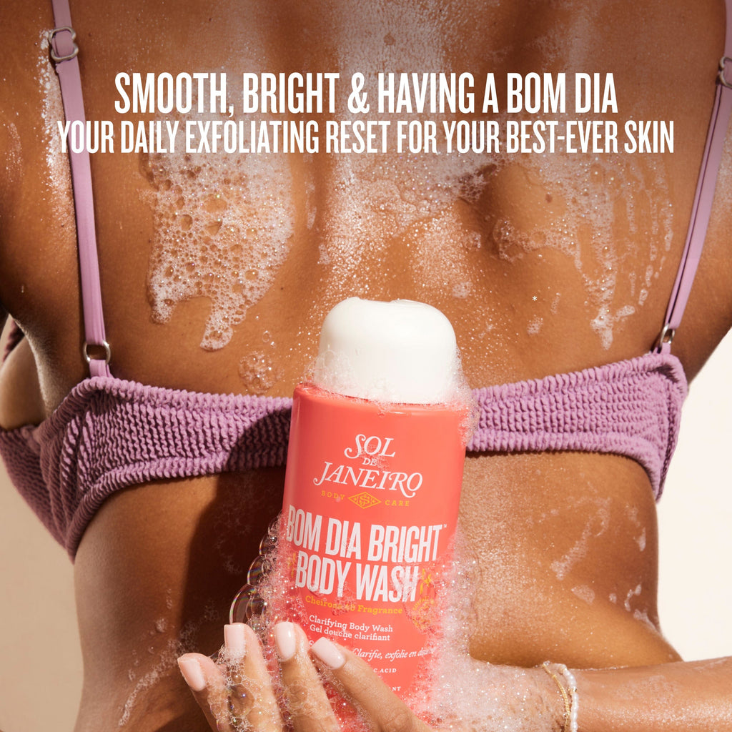 Person using Sol de Janeiro Bom Dia Bright Body Wash with text about skin care benefits.