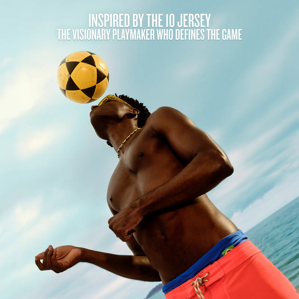 Man playing with a soccer ball against a blue sky background, inspired by the 10 jersey.
