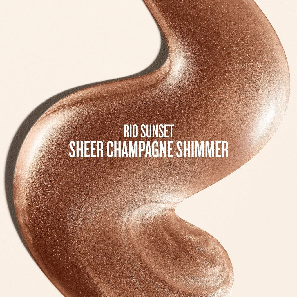 Text on image reads rio sunset sheer champagne shimmer. This is a close up of a goop product shot of sol de janeiro glowmotions glow body oil in rio sunset