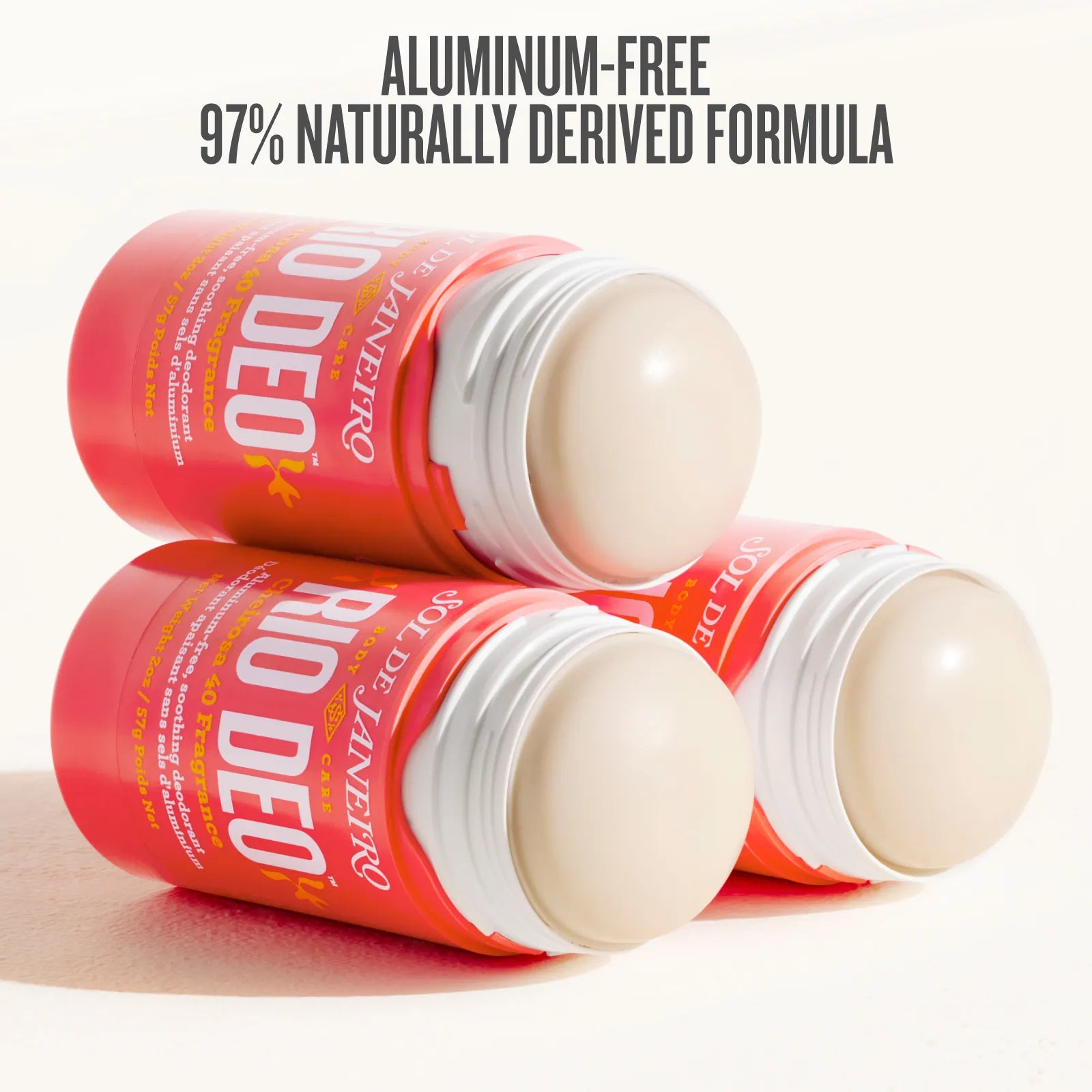 Two red containers of Rio Deo deodorant on a white background with text about an aluminum-free formula.