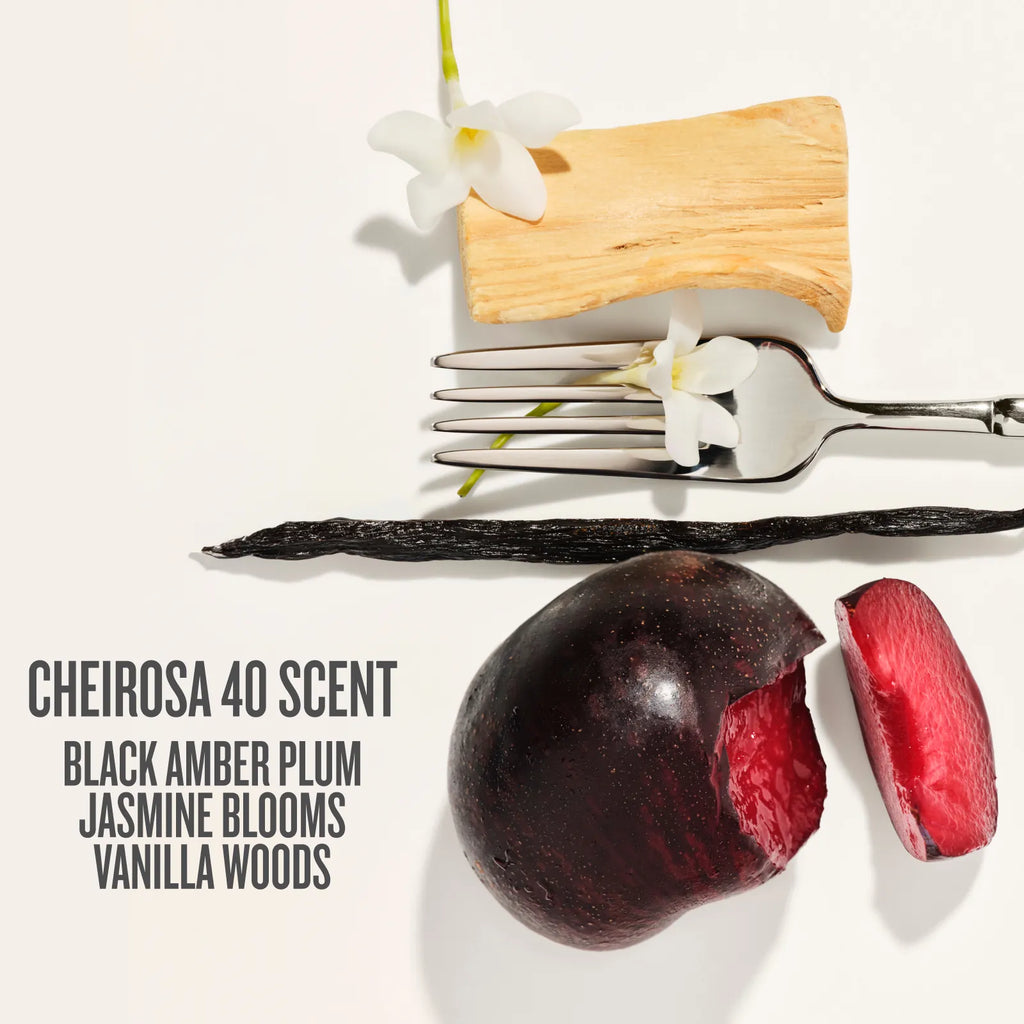 Vanilla pod, plum, and vanilla flowers with text describing a scent on a white background
