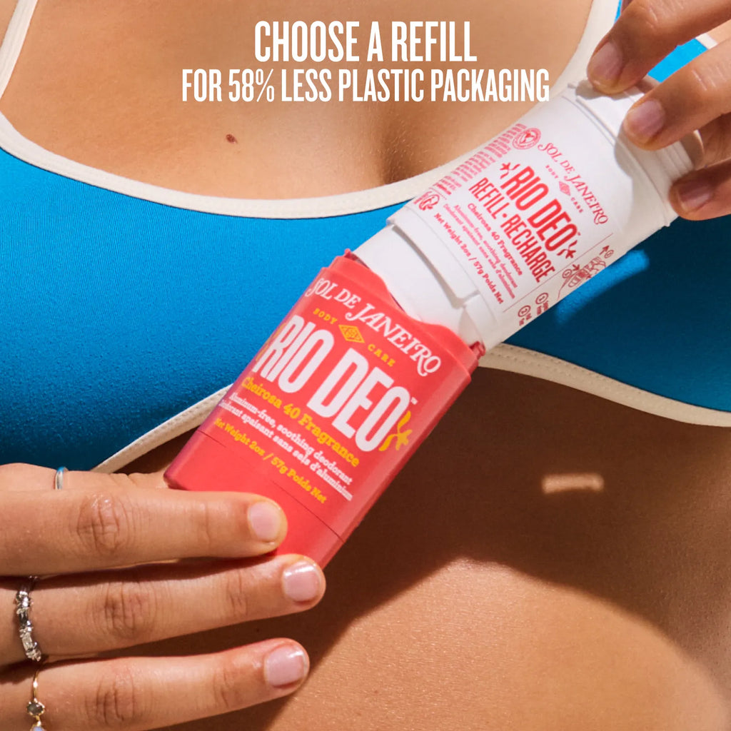 Person using a Rio De Janeiro refillable deodorant stick with text about plastic packaging reduction.
