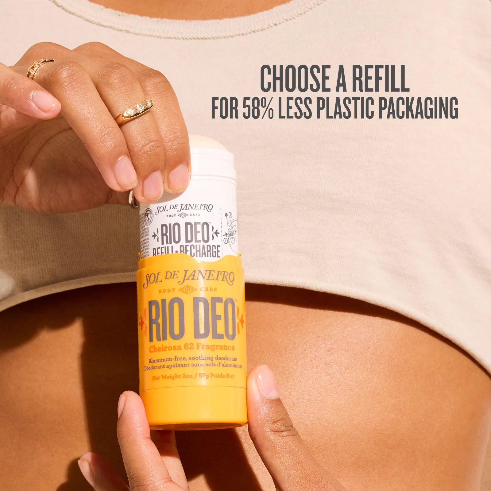 Person holding a Rio Deo deodorant can with refill option text.