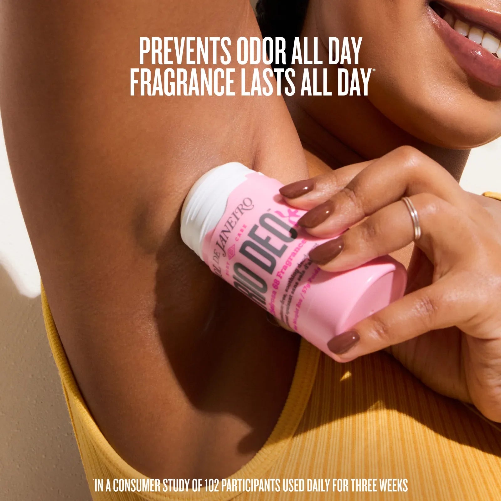 Person applying deodorant with text about odor prevention and fragrance duration.