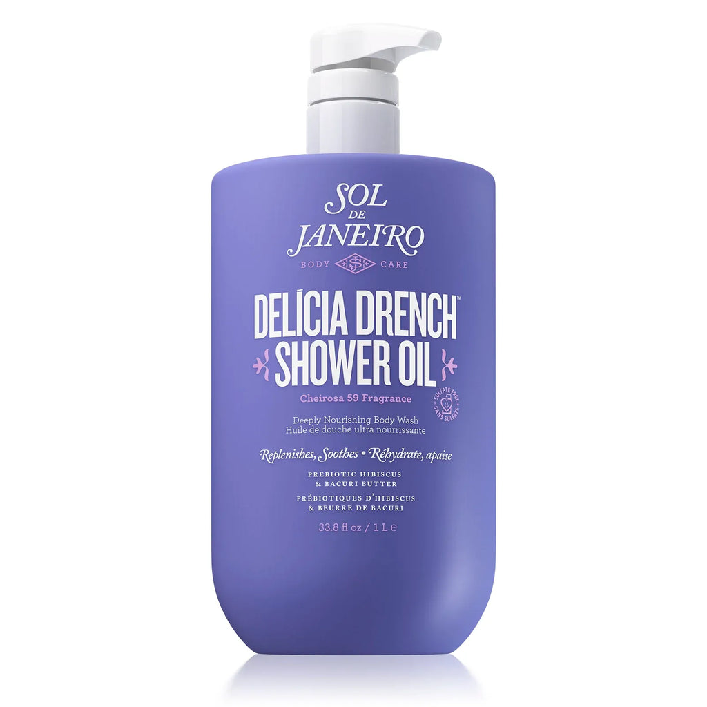 Purple bottle of Sol de Janeiro Delicia Drench Shower Oil on a white background 1 liter size